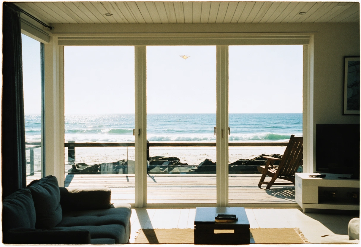 Stylish high-impact windows in a coastal home, seamless integration with design, sunny beach view, focus